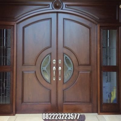 Pintu Kayu Jati Lengkung Kupu Tarung Kombinasi Kaca